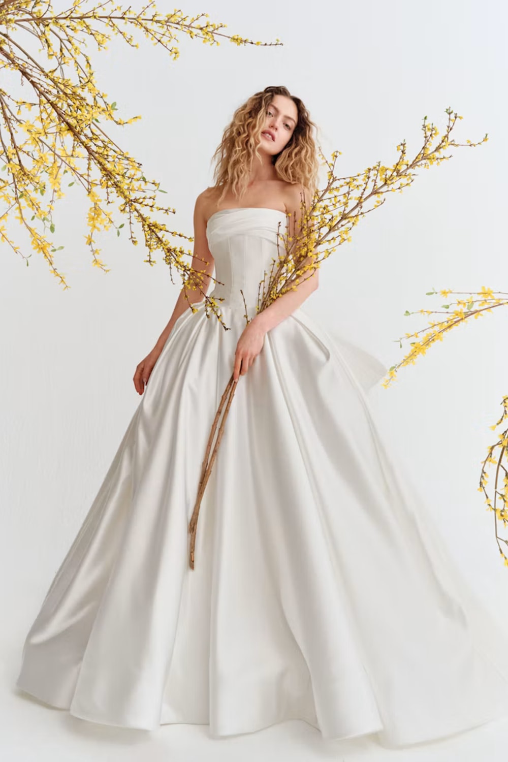 Elegant Ball Gown with Bow Detail by Alyne by Rita Vinieris — image 1 of 3