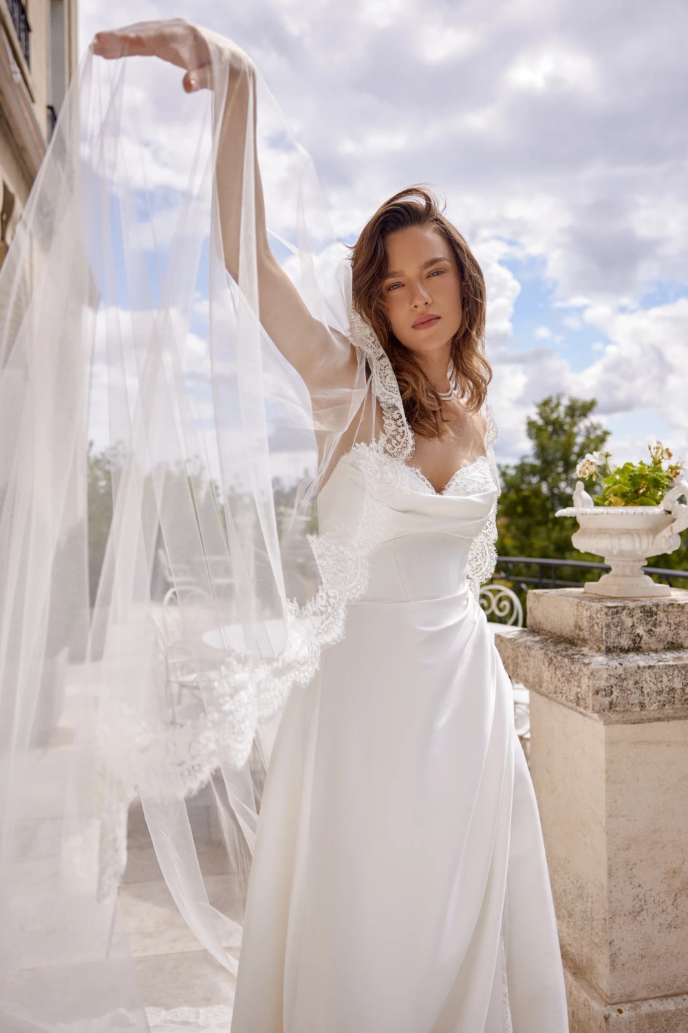 Modern A-Line Wedding Dress with Simple Lace Detailing by Justin Alexander Signature — image 2 of 3