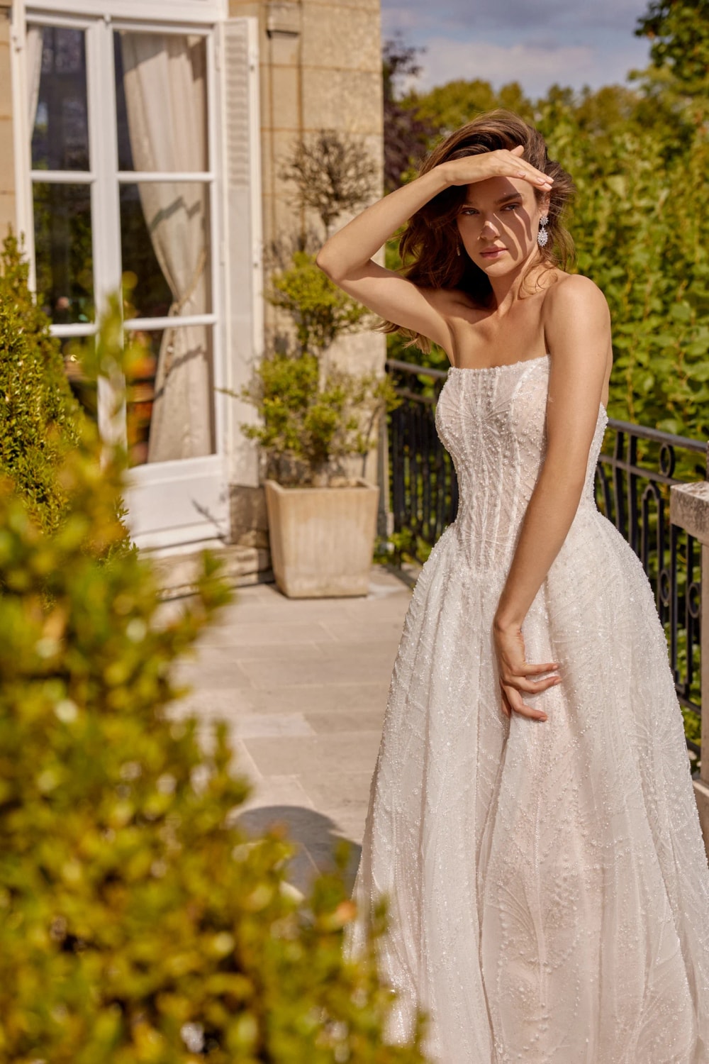 Sparkly and Beaded Strapless Ball Gown by Justin Alexander — image 3 of 5