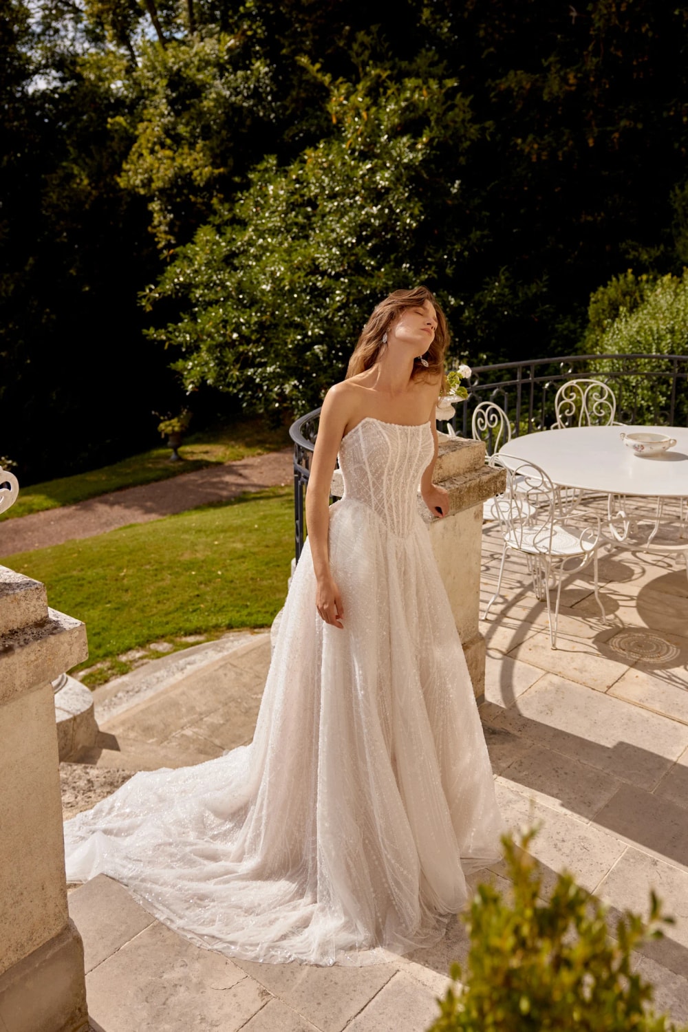 Sparkly and Beaded Strapless Ball Gown by Justin Alexander — image 2 of 5