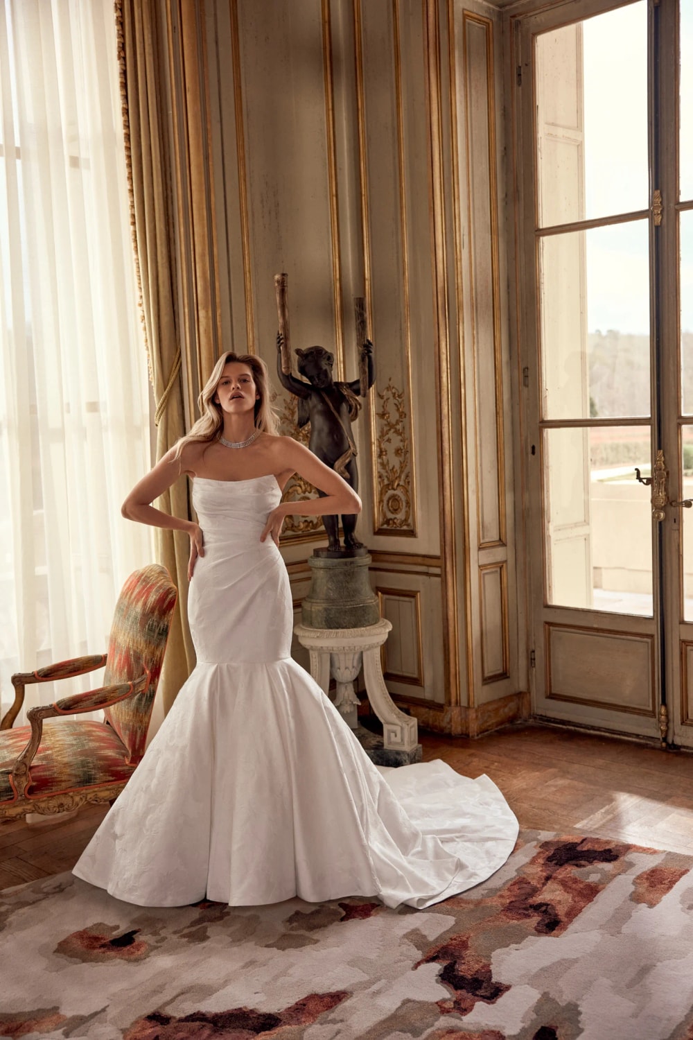 Sculpted and Fitted Mermaid Wedding Dress by Justin Alexander Signature — image 1 of 4