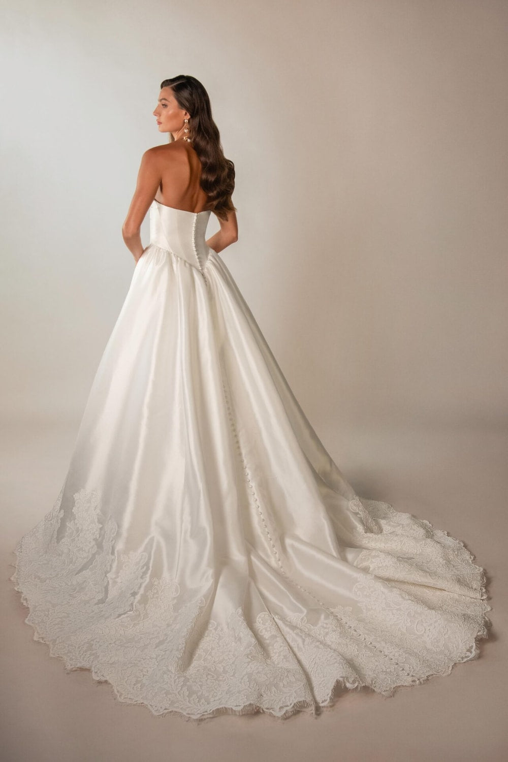 Strapless A-Line Wedding Dress with Intricate Lace Trim and Detailing by Martina Liana — image 2 of 2
