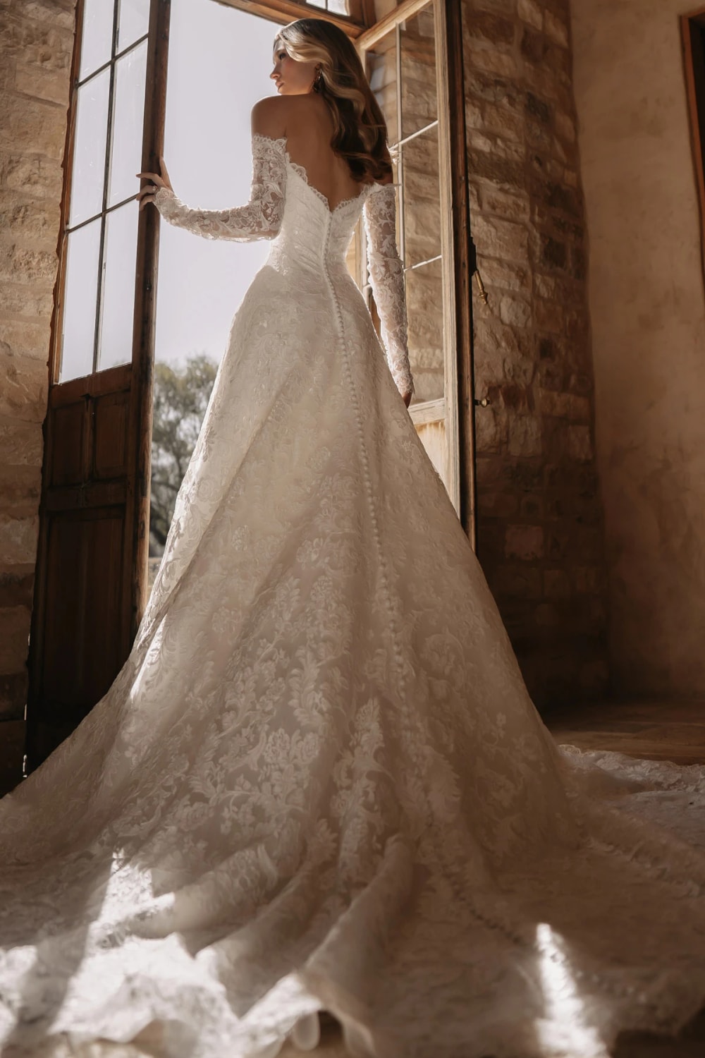 Plus-Size Romantic Lace Off-the-Shoulder Sleeve A-Line Wedding Dress by Martina Liana — image 4 of 4