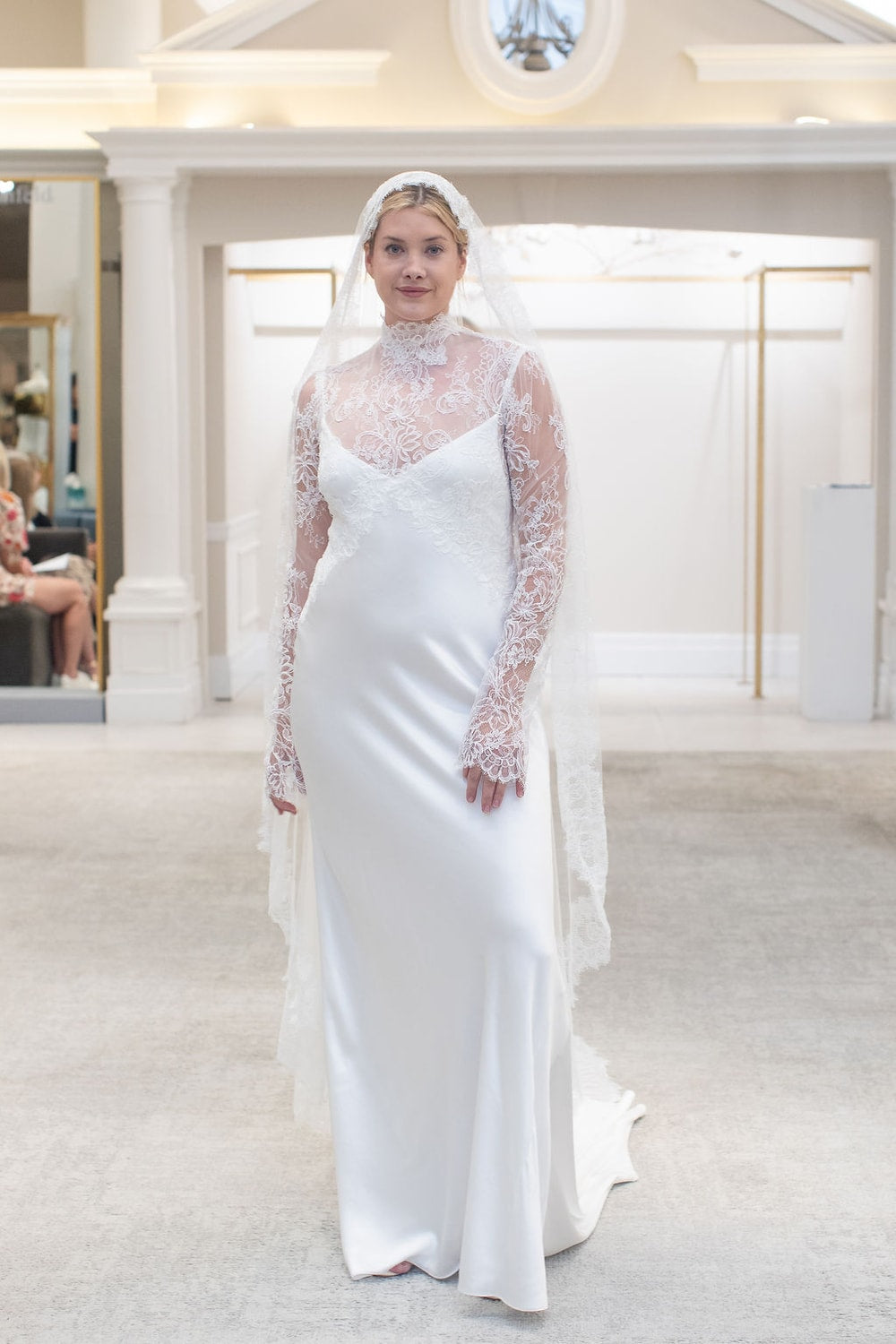Sexy and Modern Lace Long Sleeve Sheath Wedding Dress with an Open Back by Martina Liana for Kleinfeld — image 1 of 2