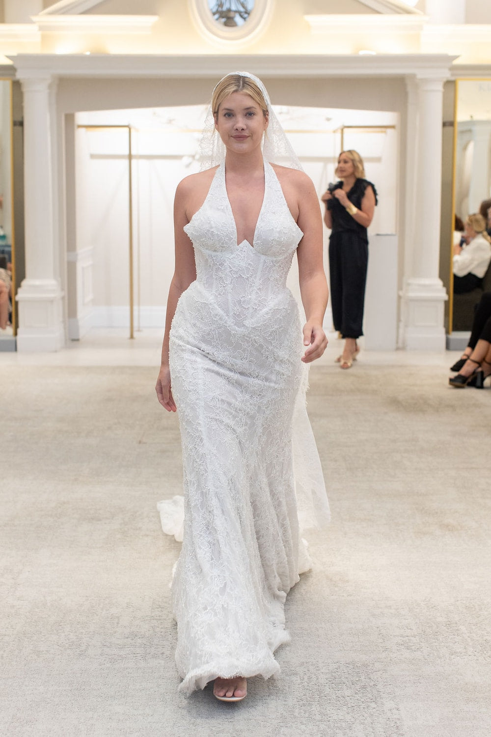 Modern Halter Fit-And-Flare Wedding Dress with Basque Waist by Martina Liana for Kleinfeld — image 1 of 2