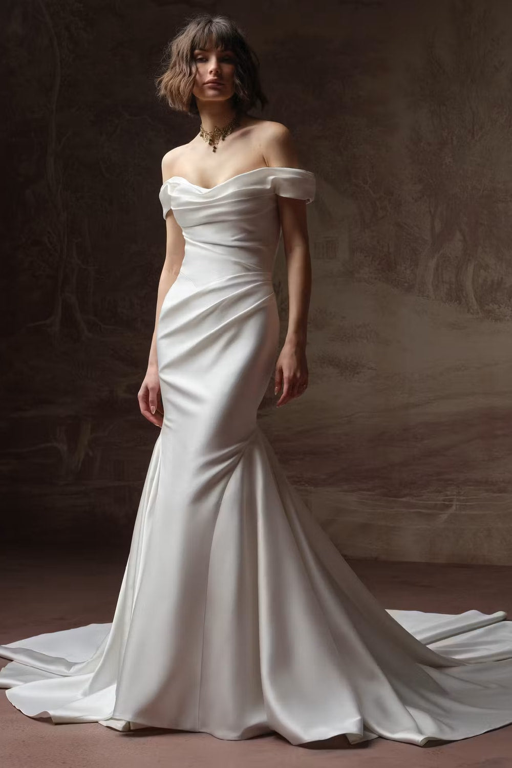 Sleek Fit-And-Flare Wedding Dress with Draped Bodice by Maggie Sottero — image 1 of 3