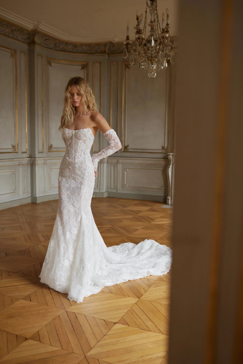 Romantic and Floral Lace Fit-And-Flare Wedding Dress by Netta BenShabu Elite Couture — image 1 of 3