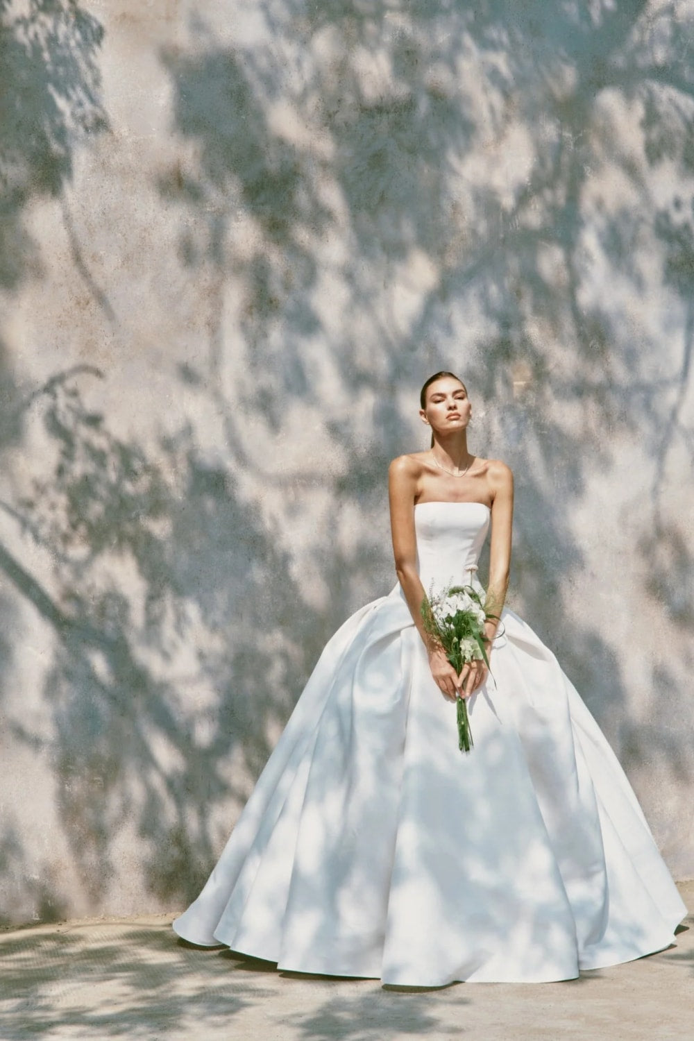 Strapless Chic and Structured Ball Gown by Nicole + Felicia — image 1 of 3