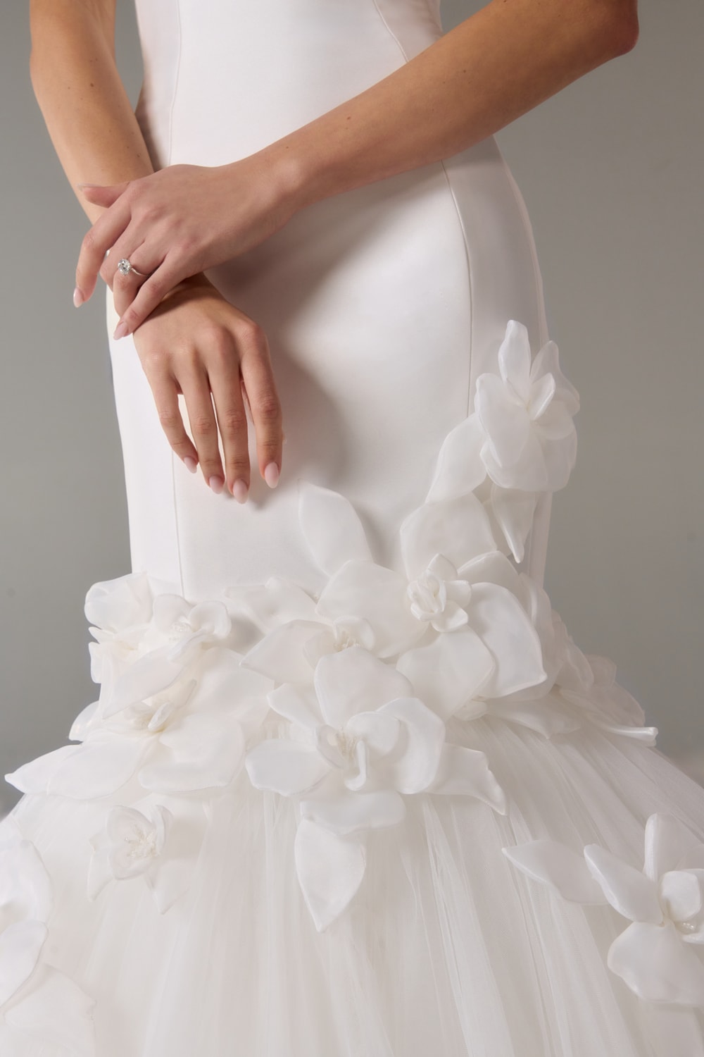 Elegant and Clean Mermaid Wedding Dress with Floral Skirt Details by Poeza — image 2 of 2