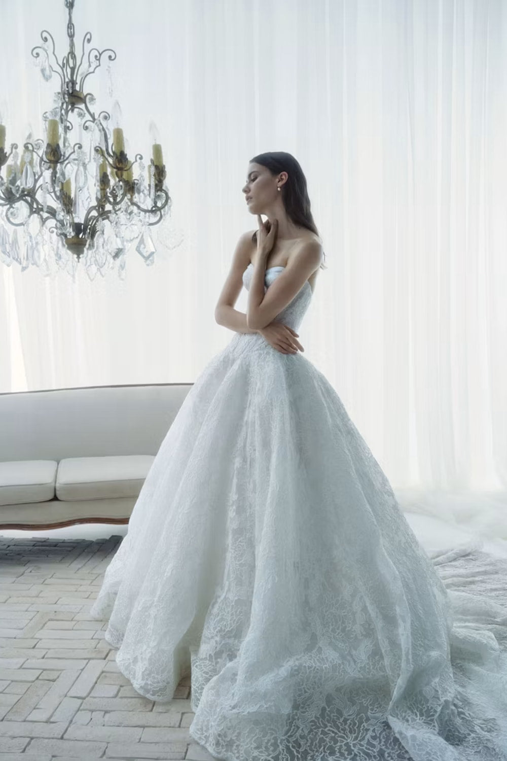 Delicate and Romantic Lace V-Neck Ballgown by Rivini — image 2 of 3