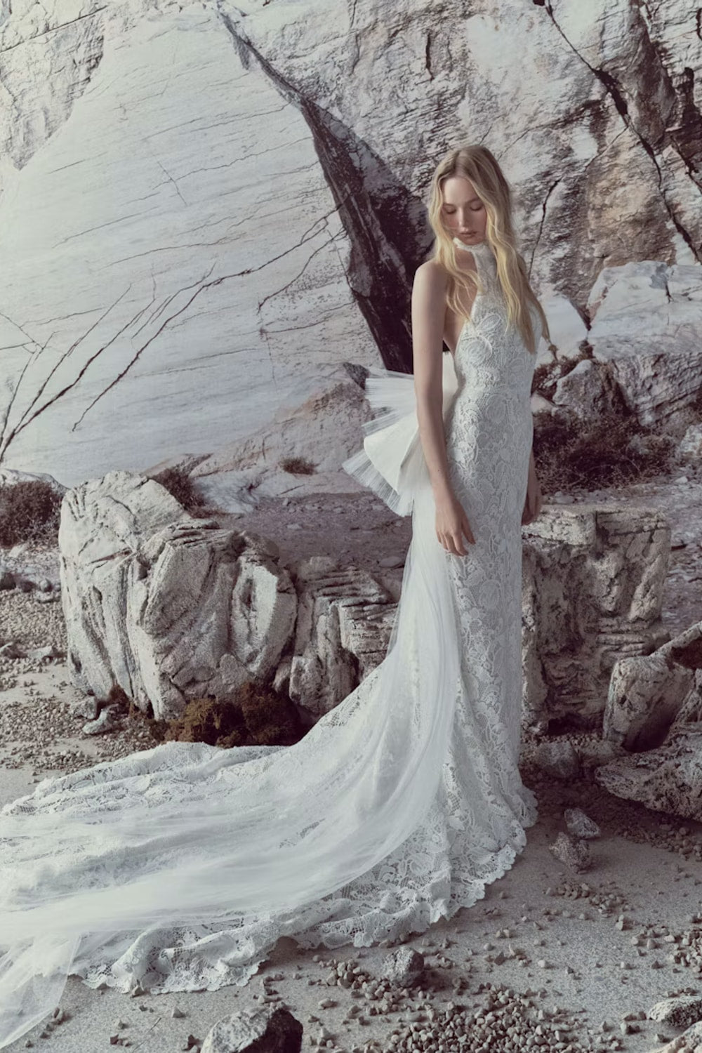 Romantic Halter Lace Sheath Wedding Dress with Ruffled Detail by Rivini — image 1 of 3