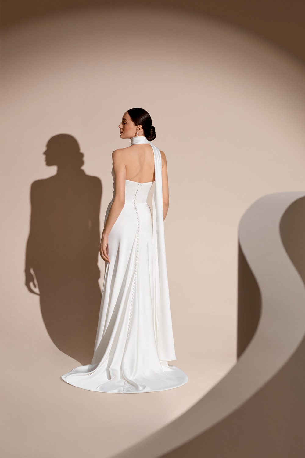 Elegant and Chic Fit-And-Flare Wedding Dress with a Cat-Eye Bodice by Savannah Miller — image 2 of 2