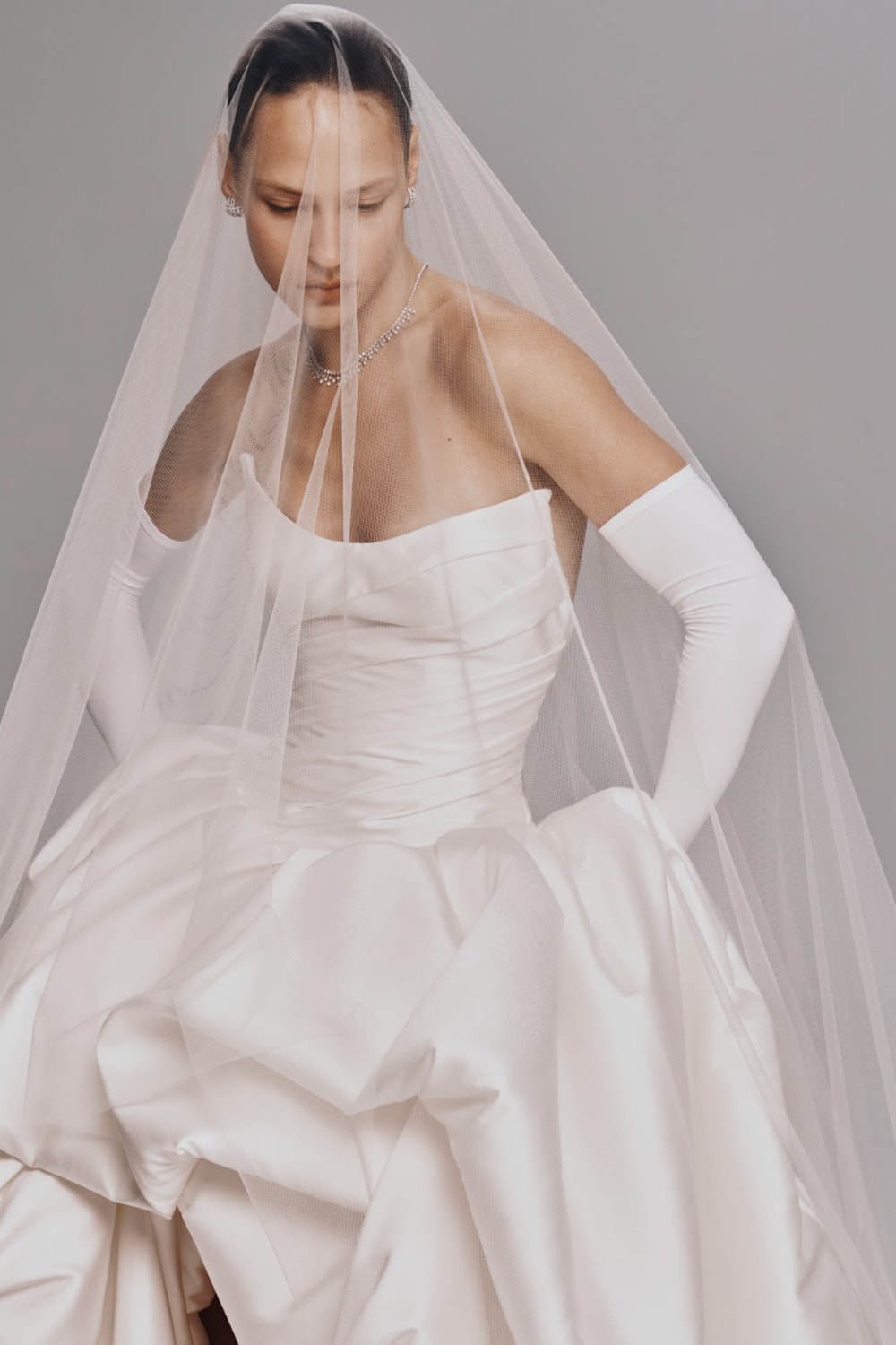 Modern and Sculptural High-Low Ball Gown by Nicole + Felicia For Kleinfeld — image 4 of 4