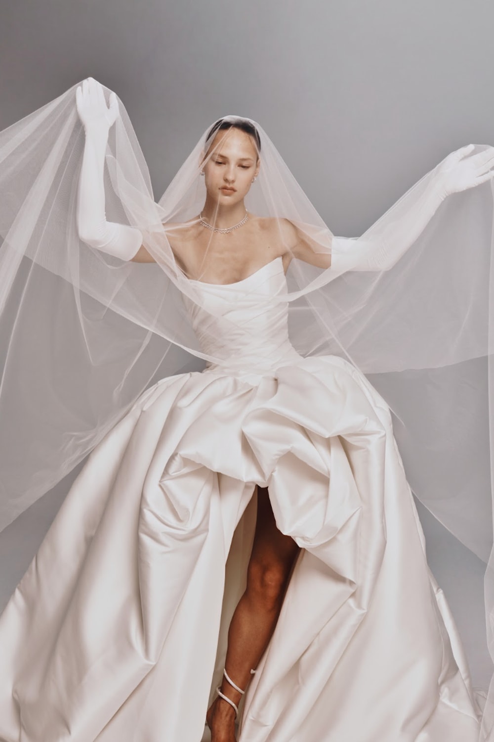Modern and Sculptural High-Low Ball Gown by Nicole + Felicia For Kleinfeld — image 3 of 4