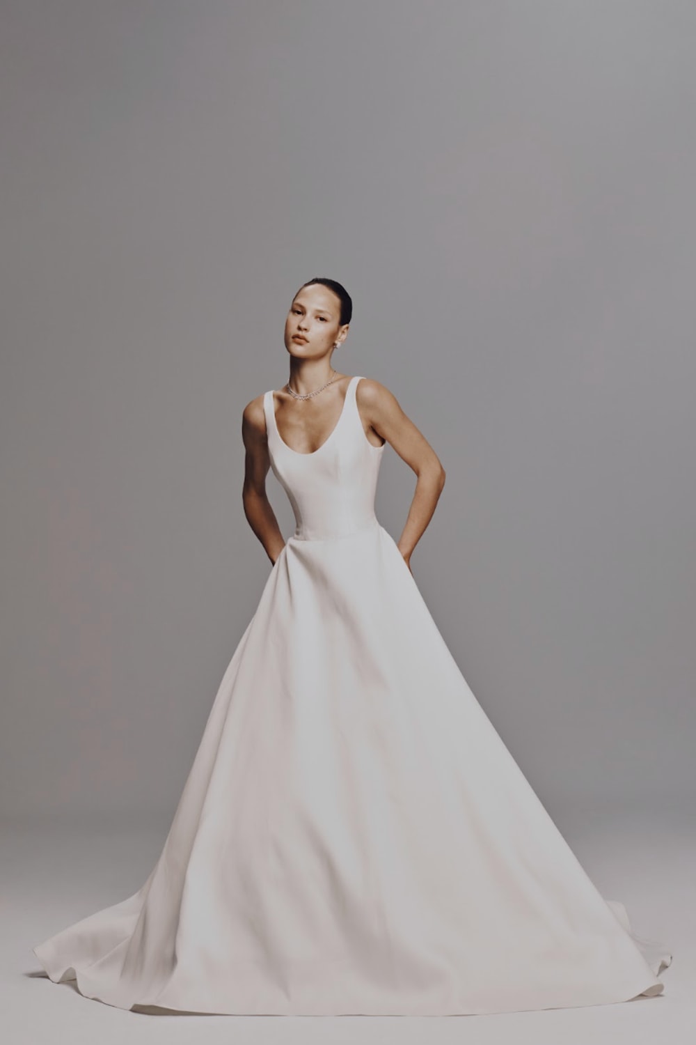 Simple Scoop Neck Wedding Dress with Detachable Jacket by Nicole + Felicia For Kleinfeld — image 2 of 5