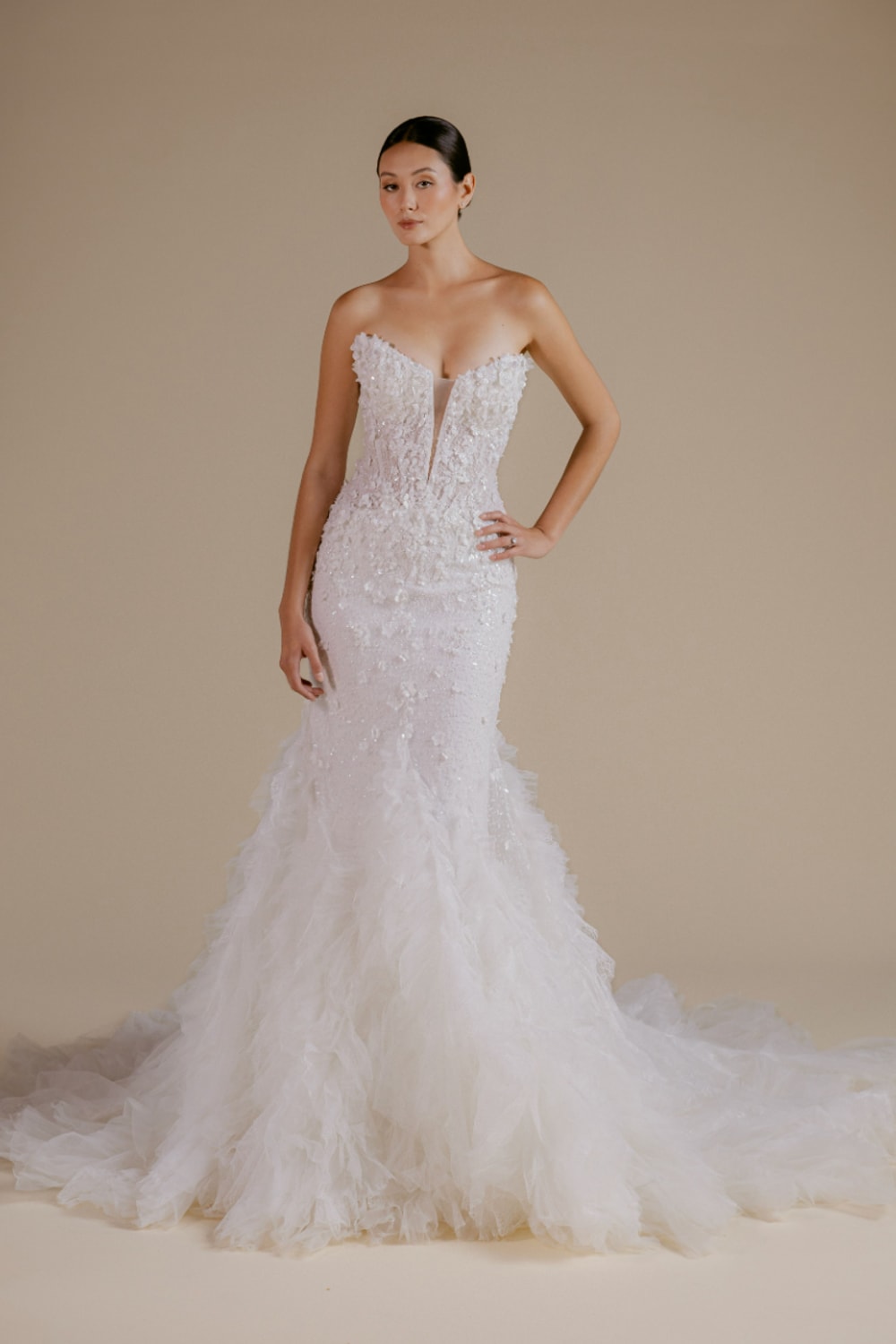 Detailed Mermaid Wedding Dress with Layered Ruffled Tulle by Viola Chan for Kleinfeld — image 1 of 4