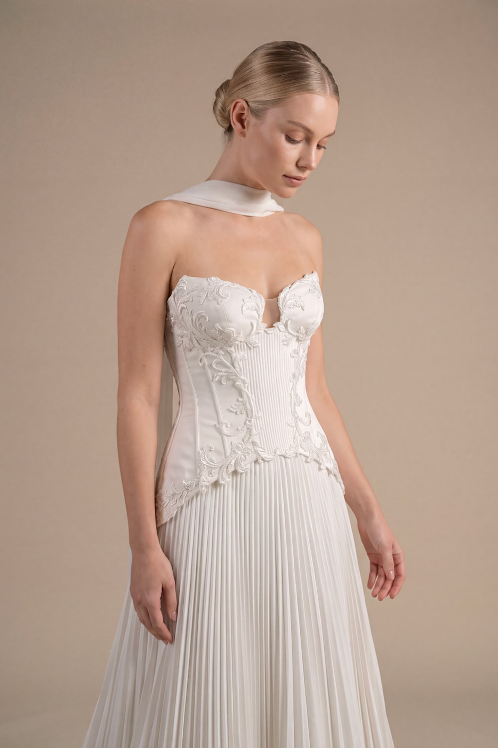 Modern Structured A-Line Wedding Dress with Pleated Skirt by Kleinfeld By Viola Chan — image 3 of 4
