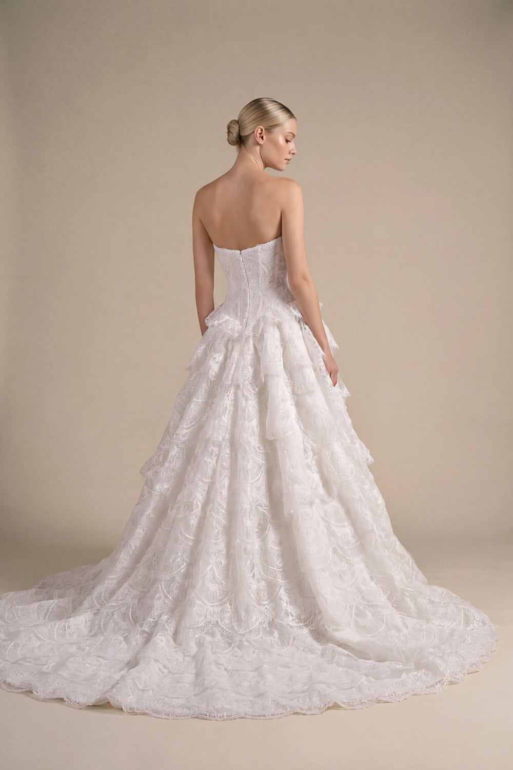Modern Ball Gown with Beading Details and Ruffled Skirt by Kleinfeld By Viola Chan — image 3 of 3