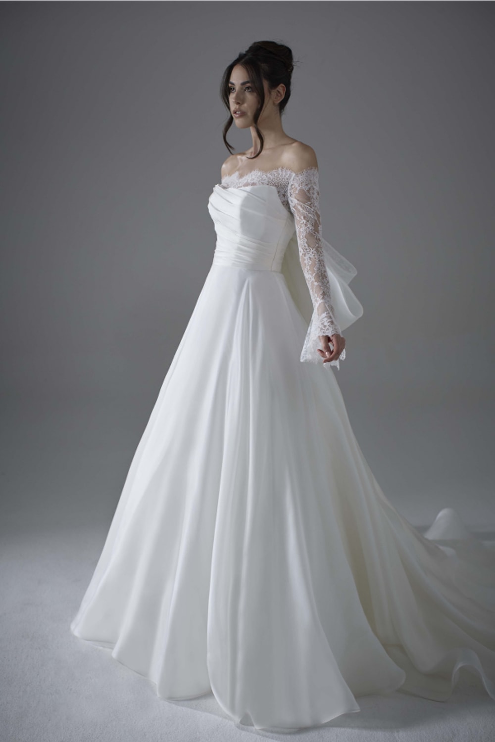 Modern A-Line Wedding Dress with Detachable Lace Topper and Bow Detail by Maison Signore — image 2 of 4