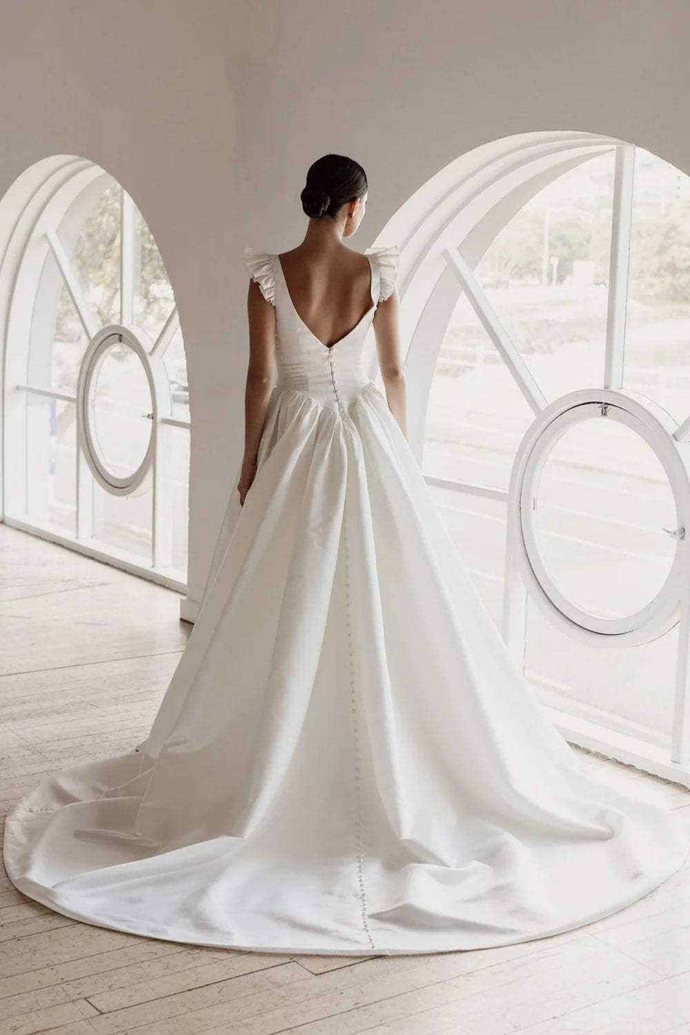 Delicate and Feminine A-Line Wedding Dress with Ruffle Straps and Basque Waist by Trish Peng — image 5 of 5