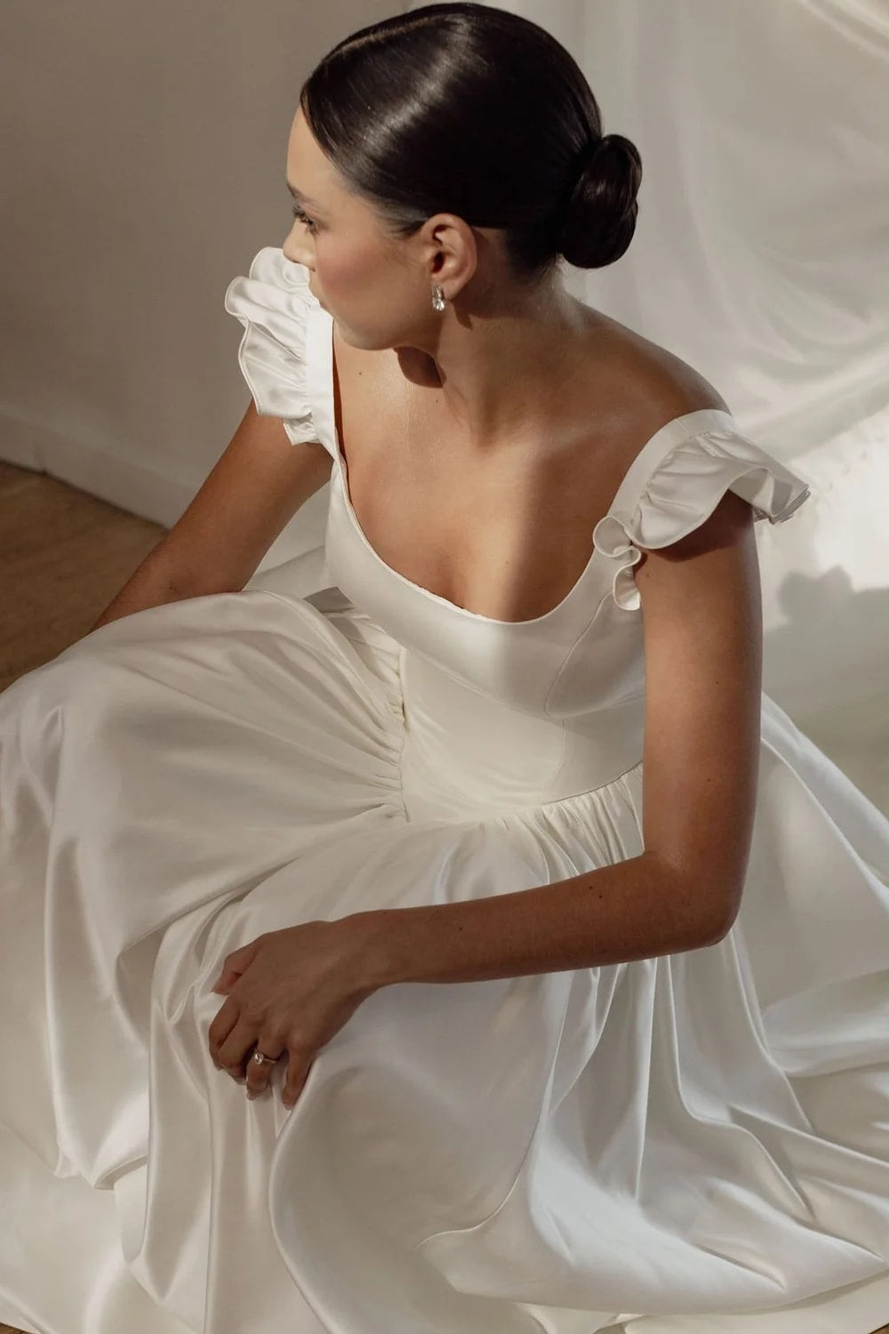 Delicate and Feminine A-Line Wedding Dress with Ruffle Straps and Basque Waist by Trish Peng — image 3 of 5