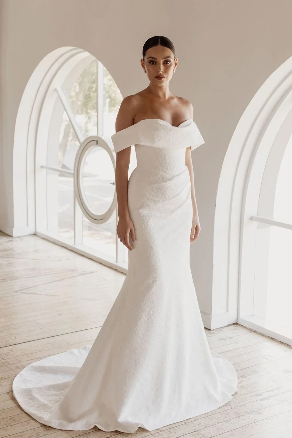 Plus-Size Modern and Sculpted Sheath Wedding Dress with Floral Lace by Trish Peng — image 1 of 5