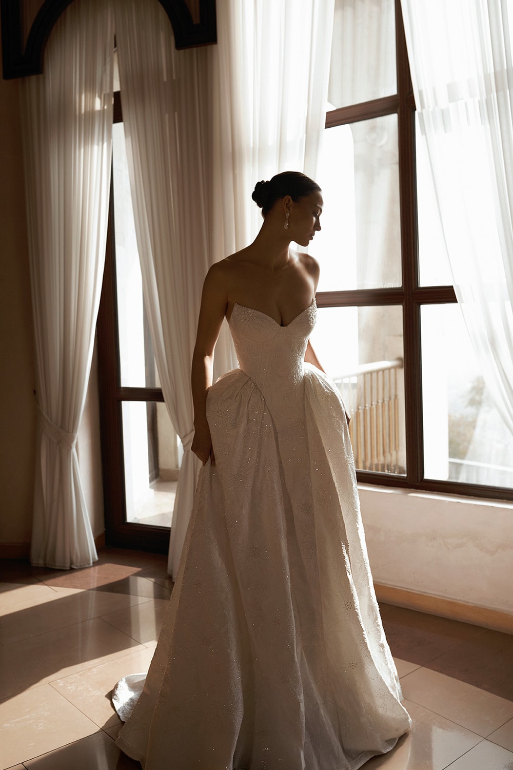 Structured A-Line Wedding Dress with Dramatic Skirt by Alon Livné — image 1 of 2