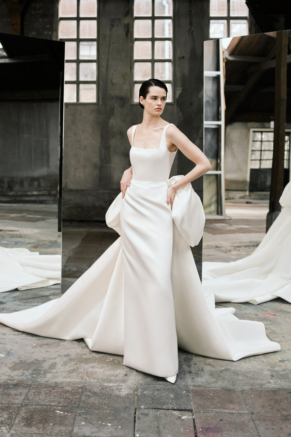Structured and Modern Sheath Wedding Dress with a Dramatic Detachable Train by Viktor & Rolf — image 1 of 2