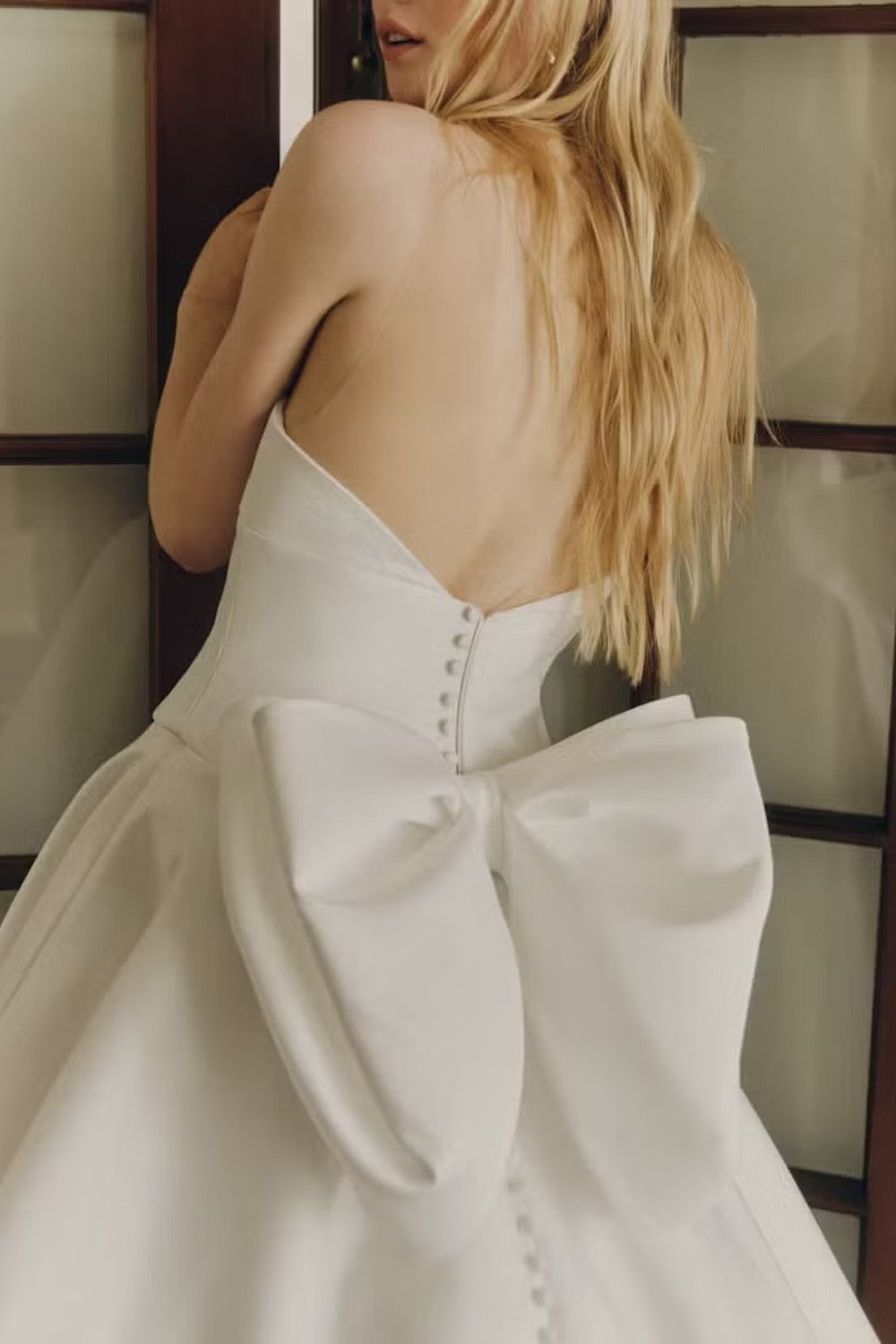 Classic And Sophisticated High-Neck Simple Ball Gown With Open Back And Bow by Alyne by Rita Vinieris — image 2 of 3