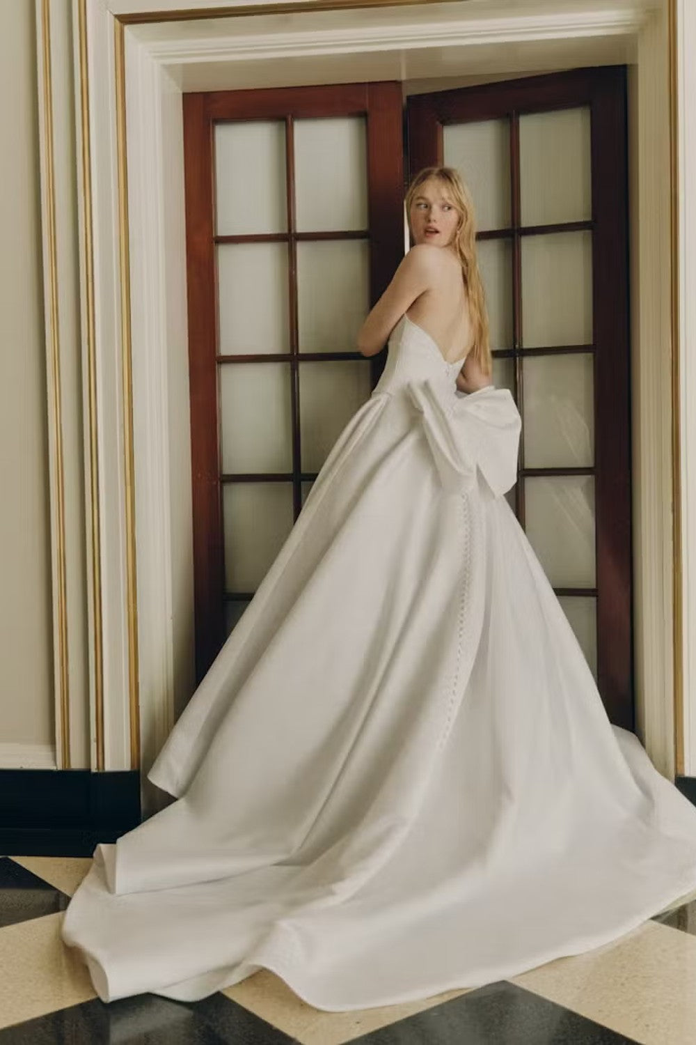 Classic And Sophisticated High-Neck Simple Ball Gown With Open Back And Bow by Alyne by Rita Vinieris — image 3 of 3