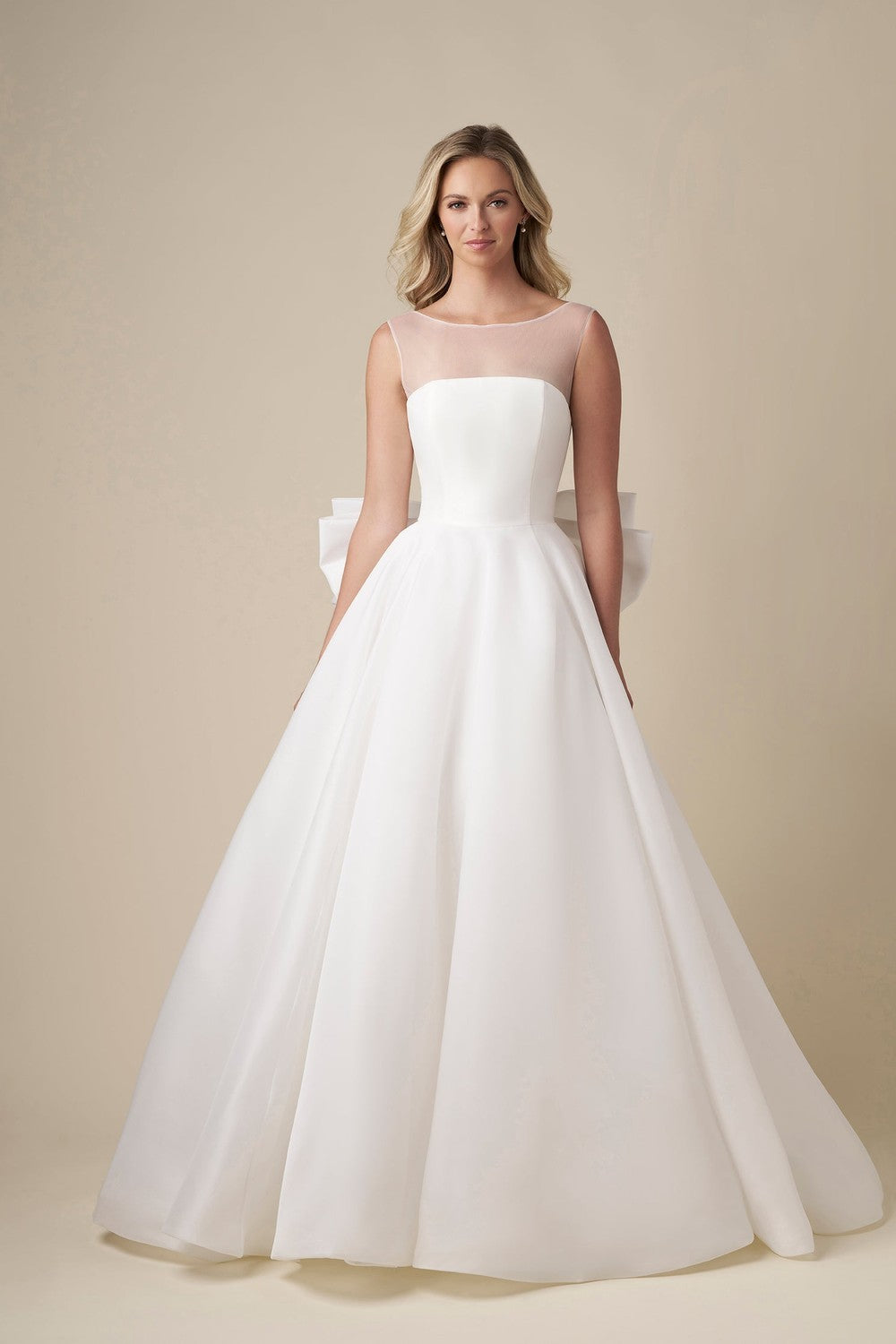 Chic And Tailored A-Line Wedding Dress With Bow And Buttons by Danielle Caprese — image 1 of 4