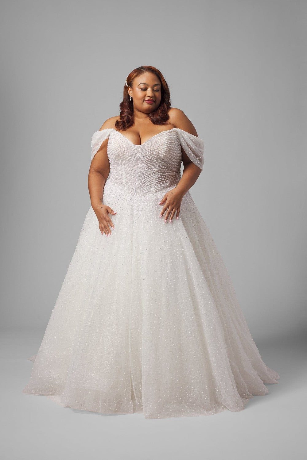 Plus-Size Dramatic And Feminine Pearl-Embellished Tulle Ball Gown by Demetrios — image 1 of 4