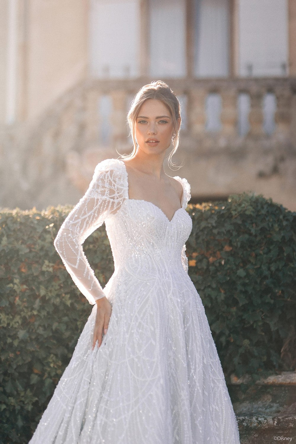 Embellished Ball Gown With Puffed Long Sleeves by Disney Fairy Tale Weddings Collection — image 2 of 5