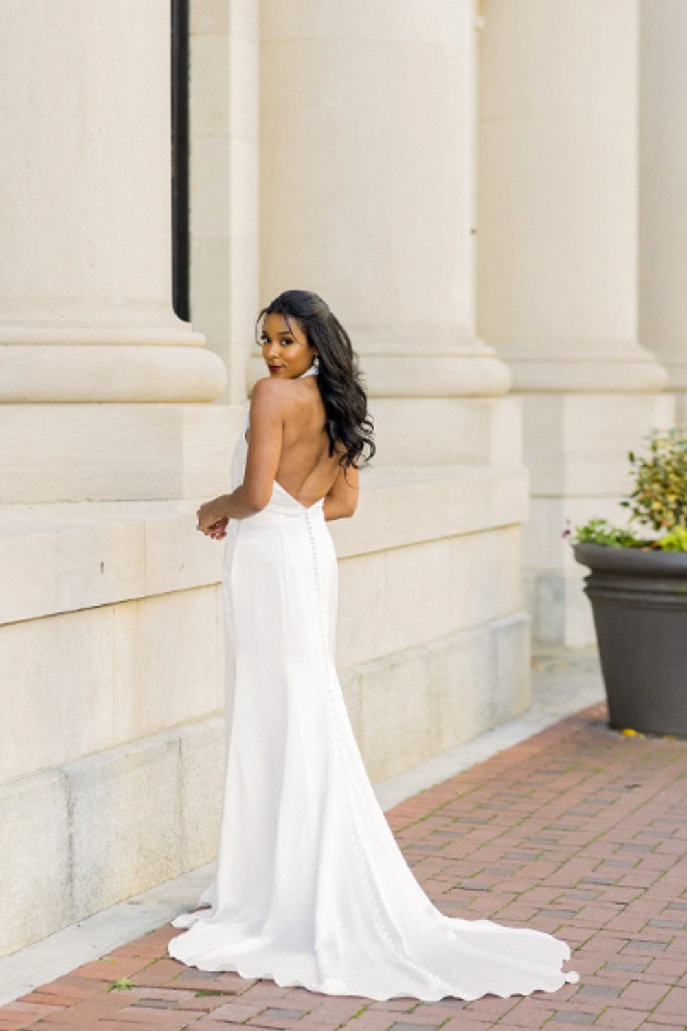 Halter-Neck Sheath Wedding Dress With Open Back And Pearl Buttons | Kleinfeld Bridal Halter-Neck Sheath Wedding Dress With Open Back And Pearl Buttons | Kleinfeld Bridal