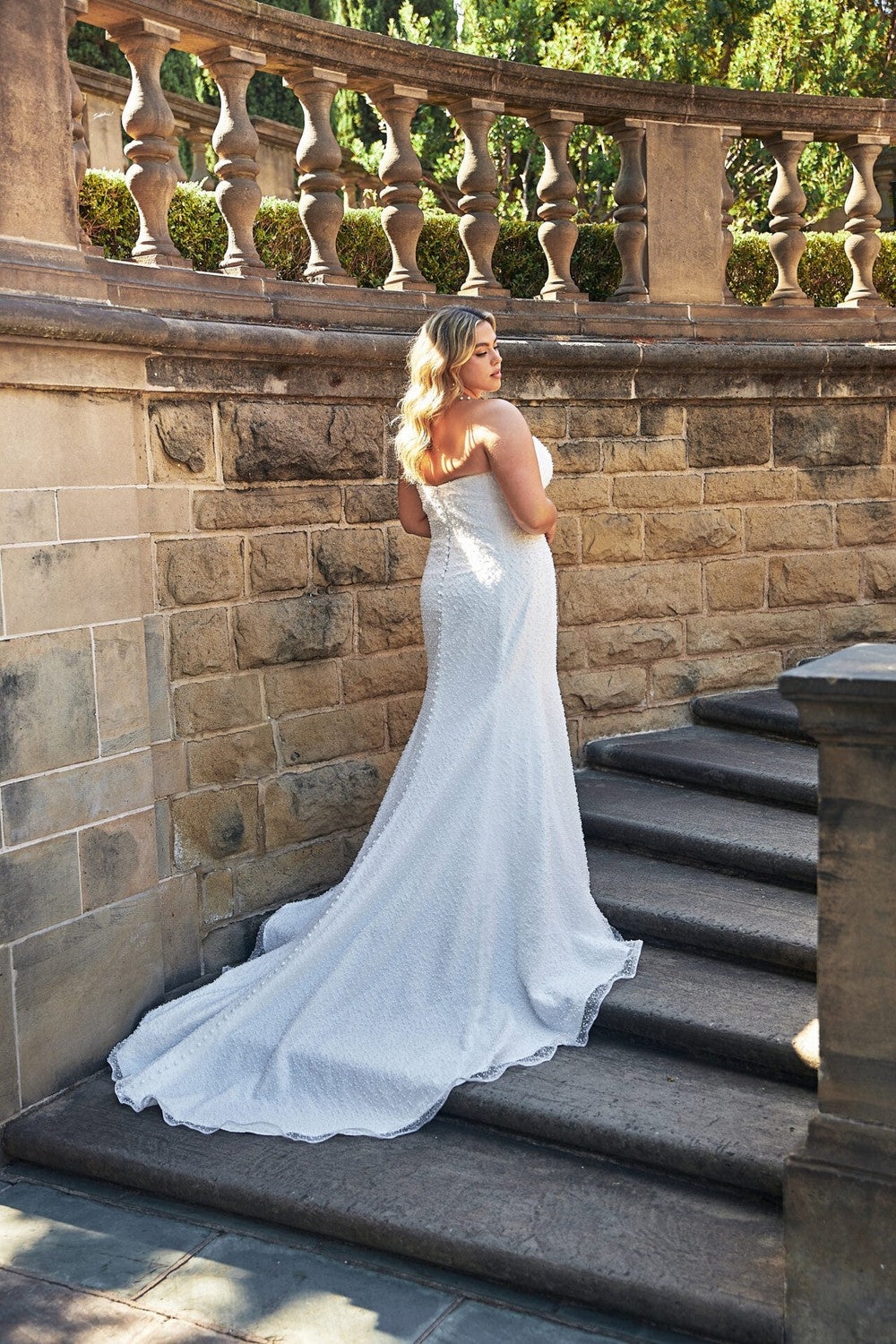 Sparkly Strapless Fit-And-Flare Wedding Dress by Essense of Australia — image 2 of 2