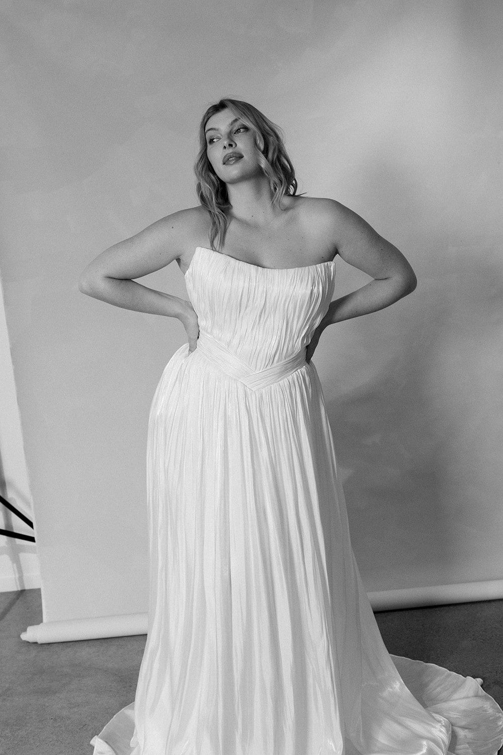 Plus-Size Chic And Modern Pleated Satin A-Line Wedding Dress With Detachable Topper by Hera Couture — image 1 of 6