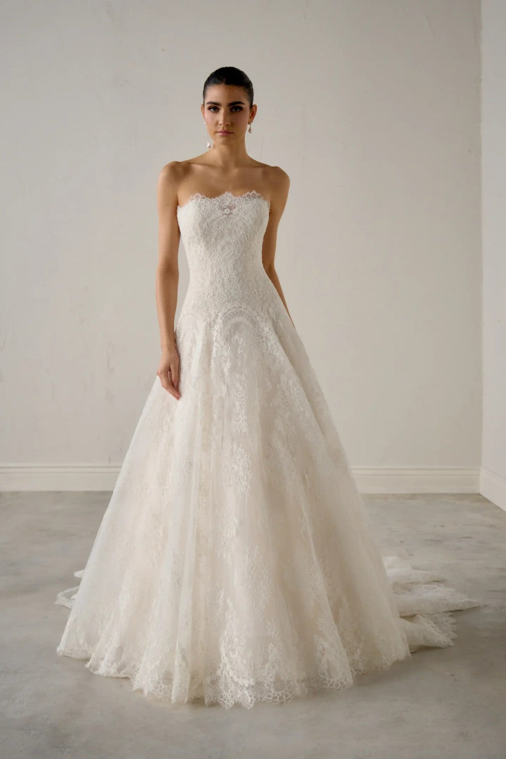 Chic And Romantic Strapless Lace Modified A-Line Wedding Dress by Justin Alexander — image 1 of 3