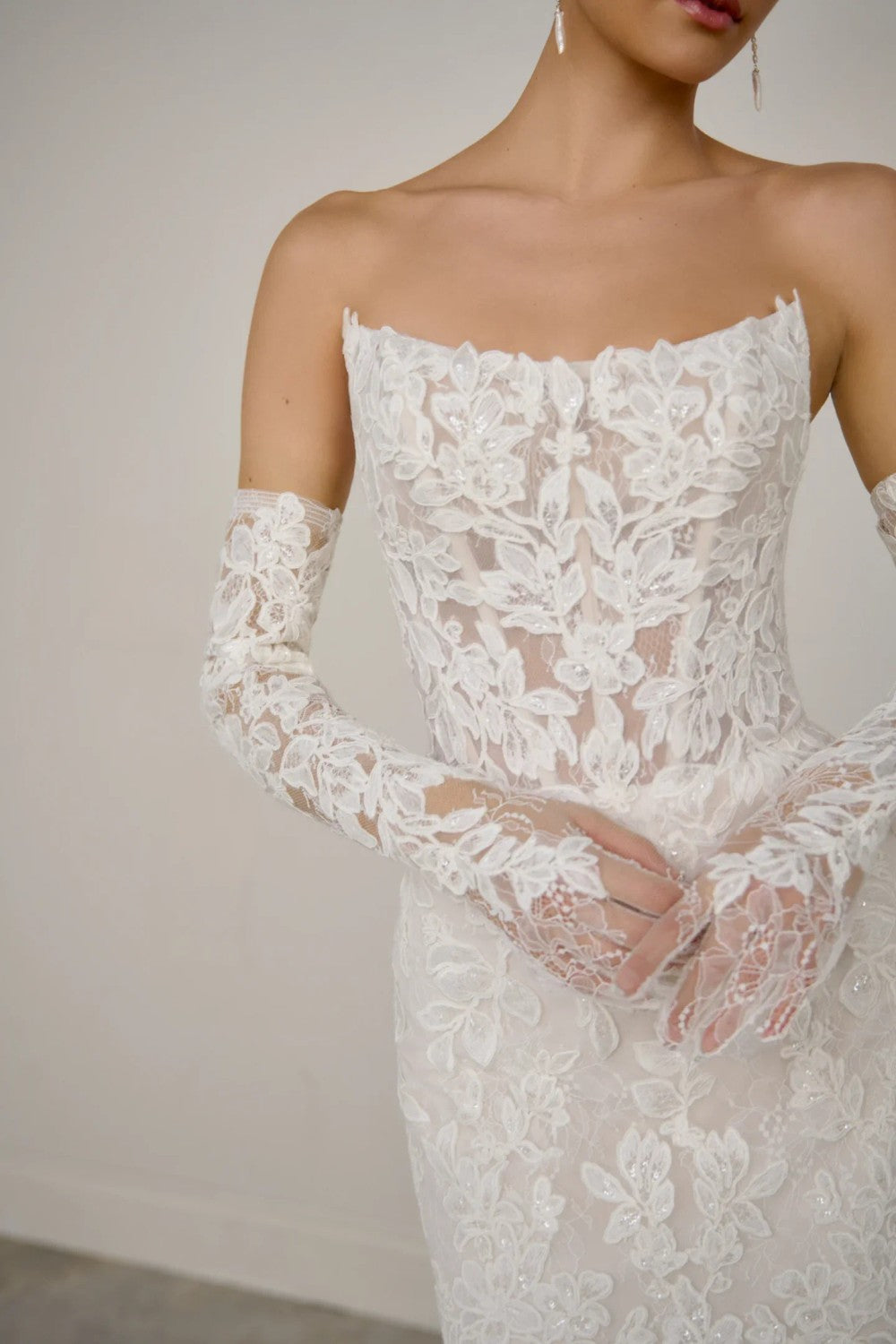 Plus-Size Strapless Lace Fit-And-Flare Wedding Dress With Detachable Sleeves by Justin Alexander — image 2 of 3