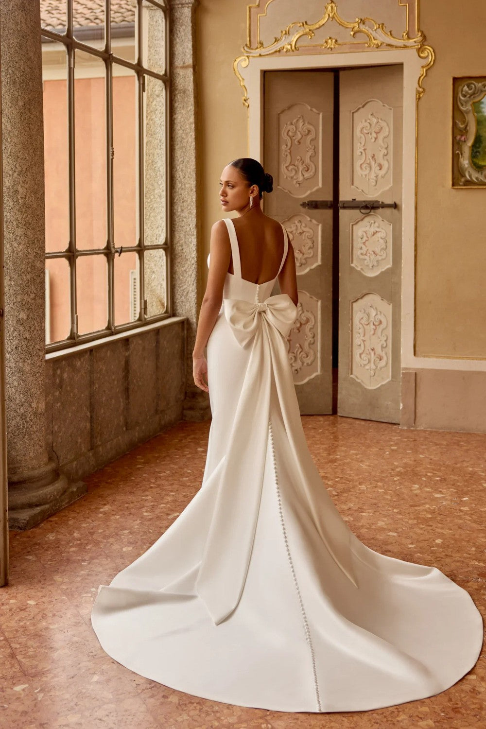 Sleek And Modern Fit-and-Flare Gown With Detachable Bow by Justin Alexander — image 2 of 4