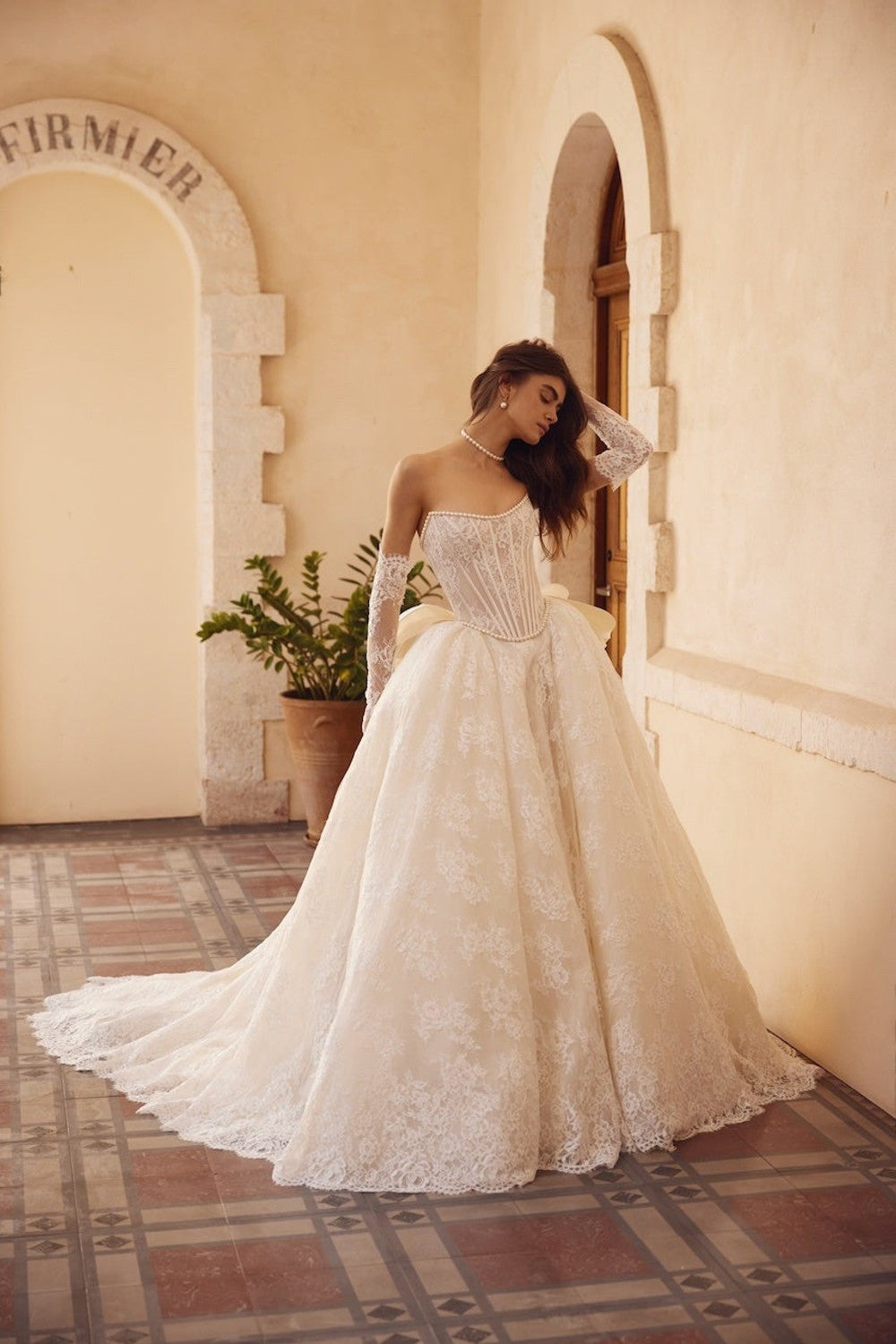 Strapless Lace Ball Gown With Pearls And Bow by Love by Pnina Tornai — image 1 of 2