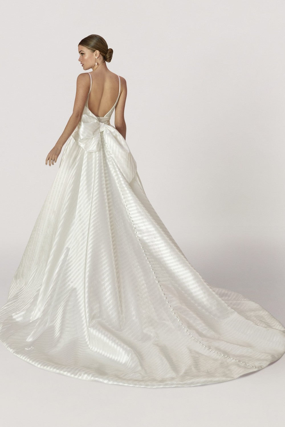 Classic And Unique Striped Ball Gown With Bow And Buttons by Madison James — image 2 of 2