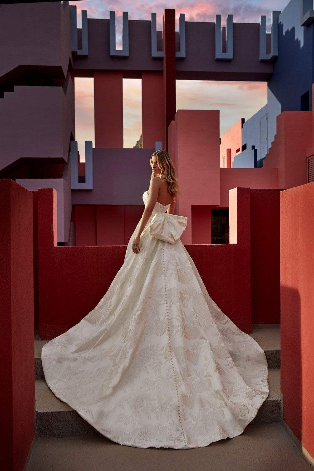 Strapless Jacquard Ball Gown With Bow And Buttons by Madison James — image 2 of 2