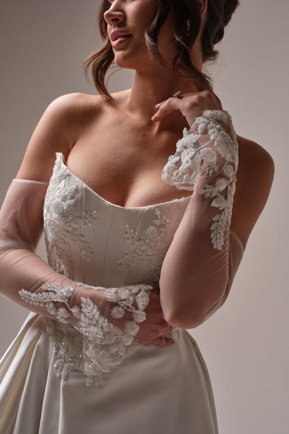 Modern And Elegant Embellished Satin A-Line Wedding Dress With Detachable Accessories by Maggie Sottero — image 2 of 5