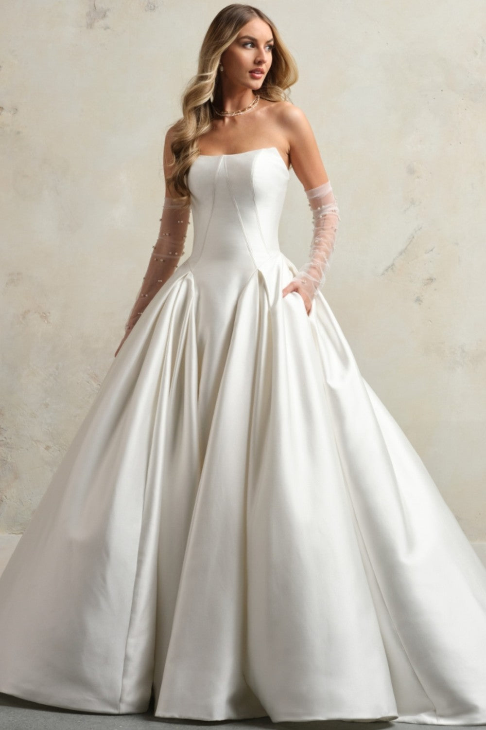 Sleek and Simple Strapless Cat-Eye Neckline Ball Gown With Buttons by Maggie Sottero — image 1 of 2