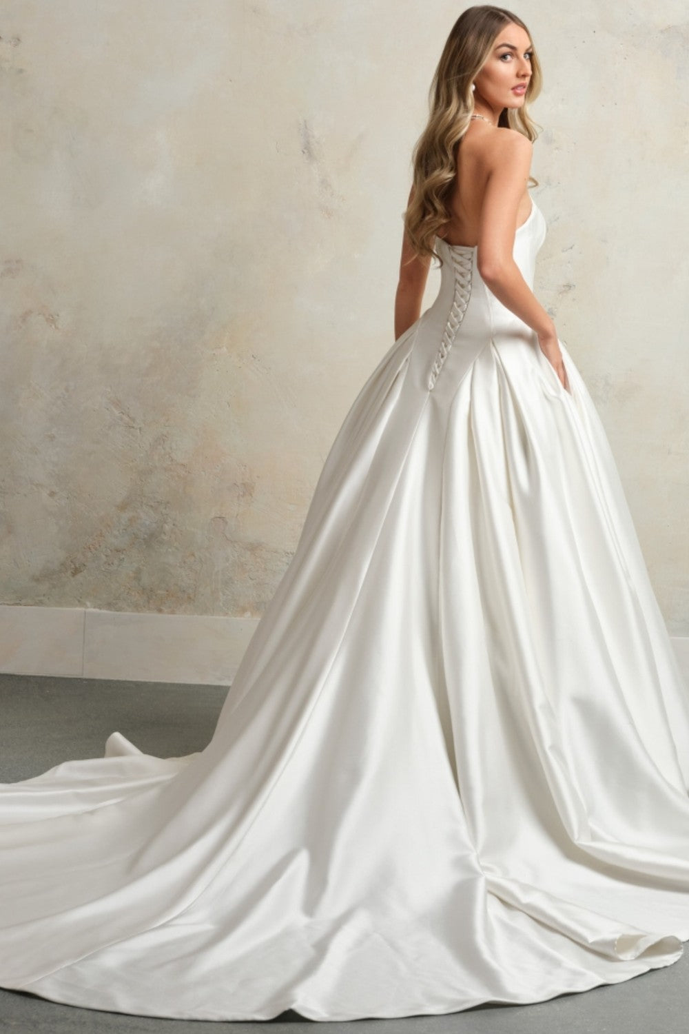 Sleek and Simple Strapless Cat-Eye Neckline Ball Gown With Buttons by Maggie Sottero — image 2 of 2