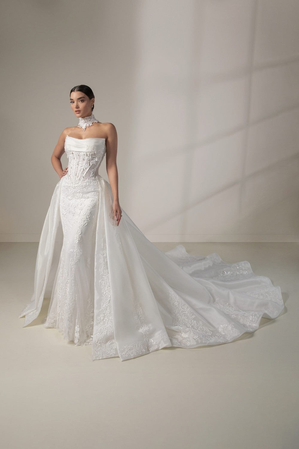 Dramatic Basque-Waist Fit-And-Flare Wedding Dress With Detachable Overskirt by Martina Liana Luxe — image 1 of 3