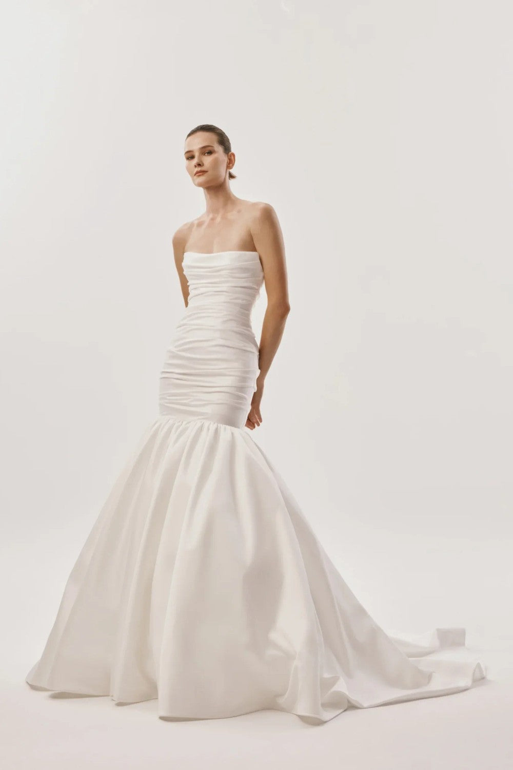 Chic And Dramatic Mermaid Wedding Dress by Nicole + Felicia For Kleinfeld — image 1 of 3