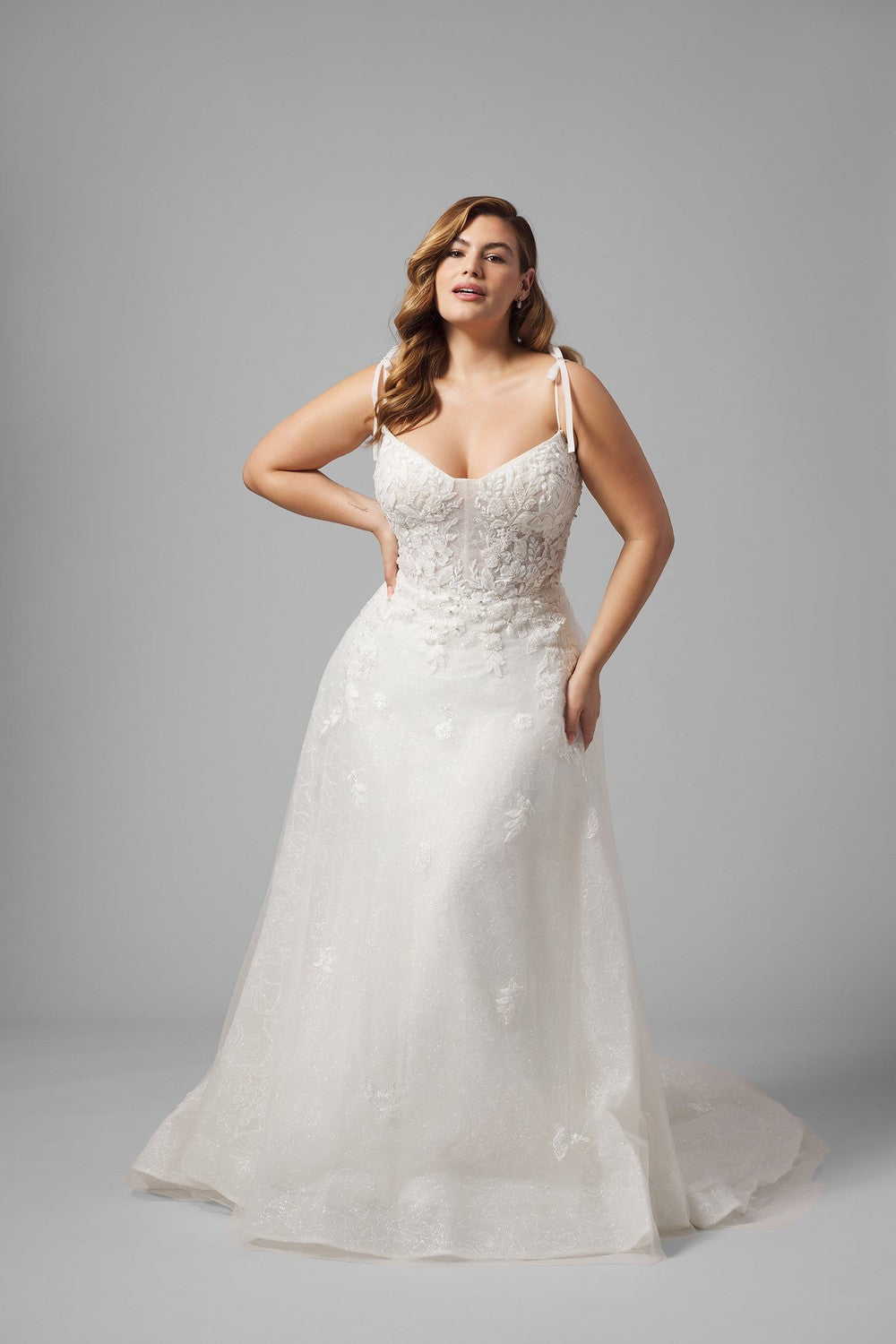 Plus-Size Romantic And Feminine Sparkly A-Line Wedding Dress With Bows by Randy Fenoli — image 1 of 3