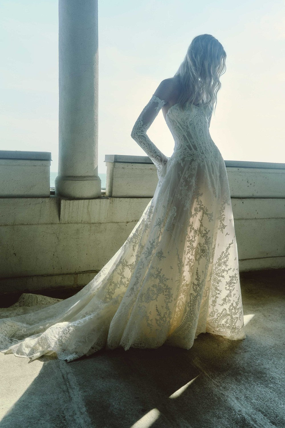 Traditonal Basque-Waist Lace Ball Gown With Detachable Sleeves by Rivini — image 2 of 2