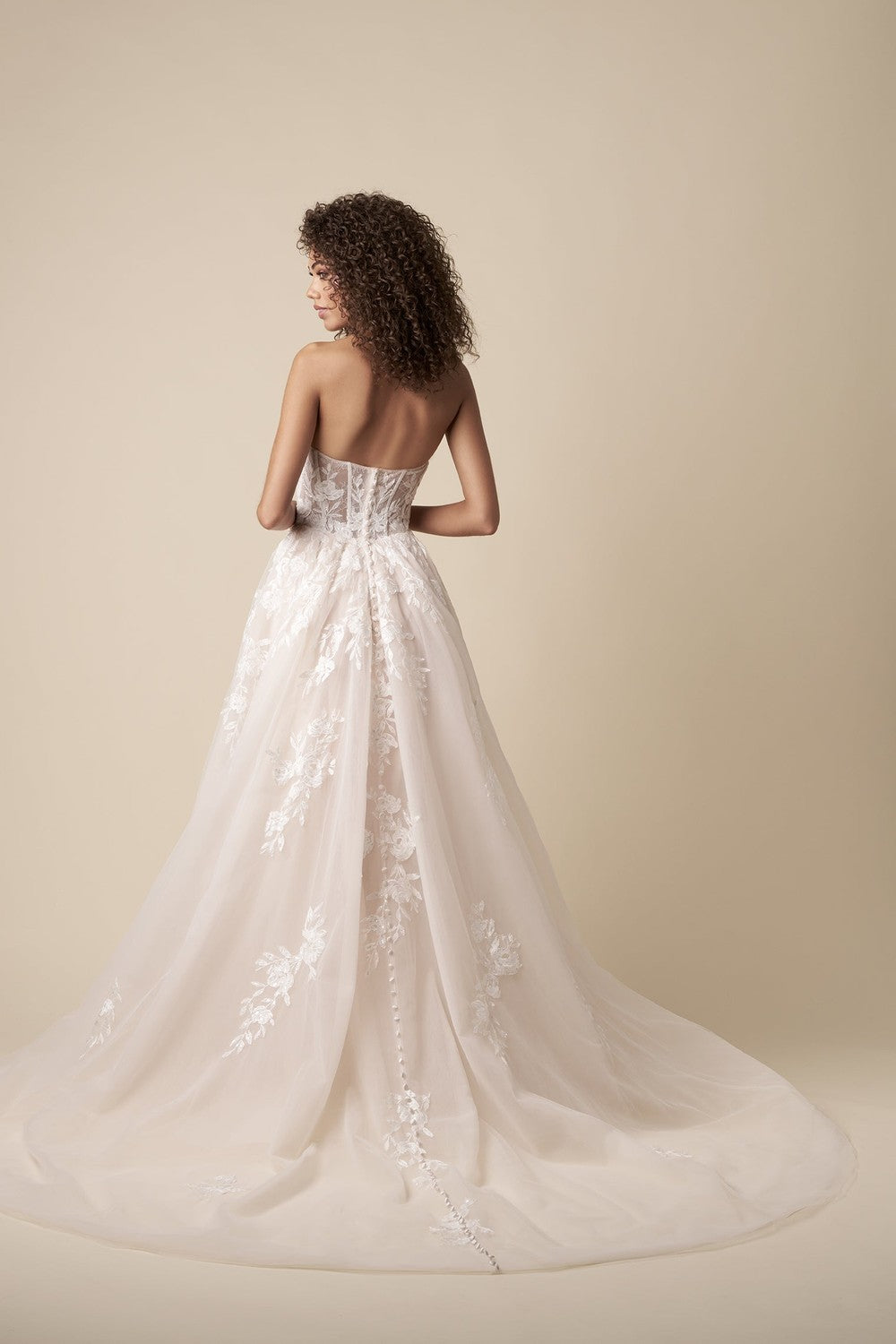 Romantic Ethereal Strapless Tulle A-Line Wedding Dress With Buttons by Kleinfeld Collection — image 3 of 3